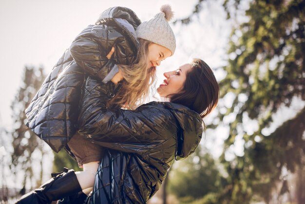 Cute and stylish family in a spring park