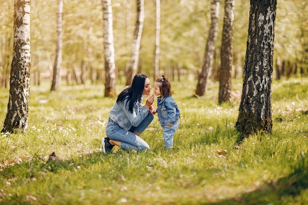 Cute and stylish family in a spring park