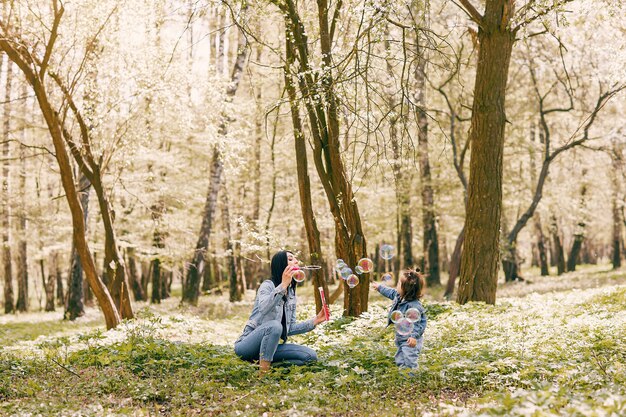 Cute and stylish family in a spring park