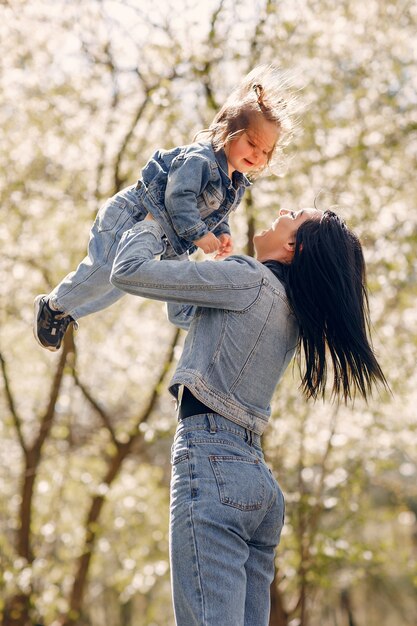 Cute and stylish family in a spring park