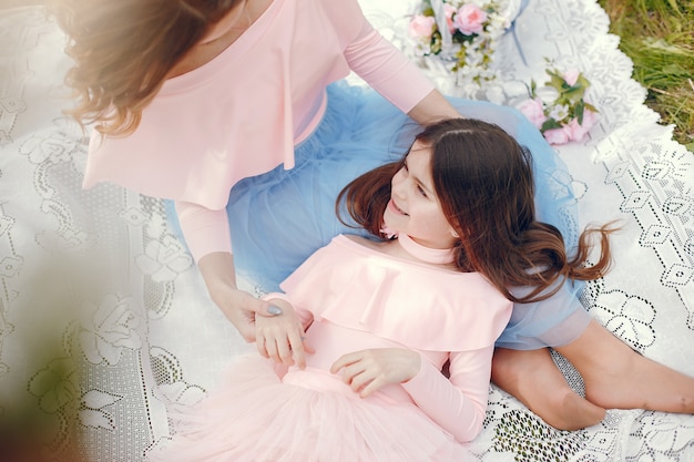 Cute and stylish family in a spring park