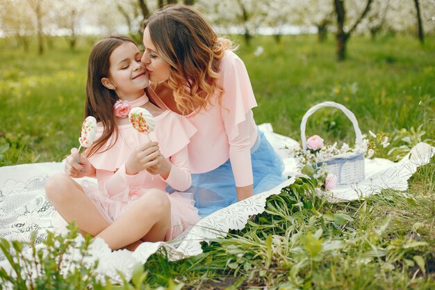 Cute and stylish family in a spring park