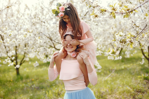 Cute and stylish family in a spring park