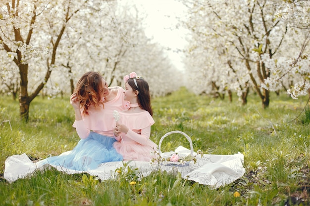 Cute and stylish family in a spring park