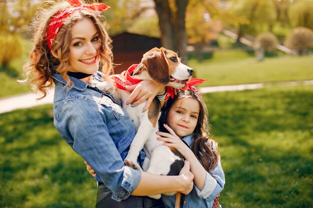 Cute and stylish family in a spring park