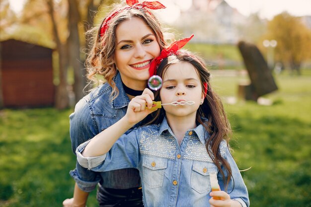 Cute and stylish family in a spring park