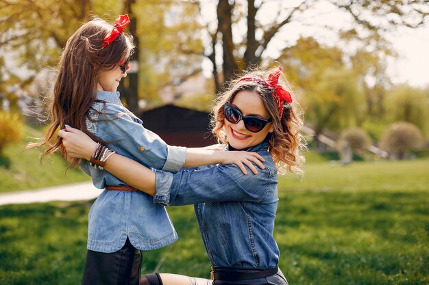 Cute and stylish family in a spring park