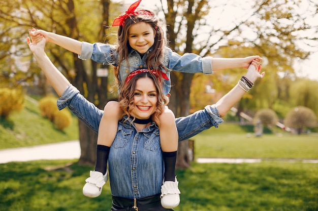 Cute and stylish family in a spring park