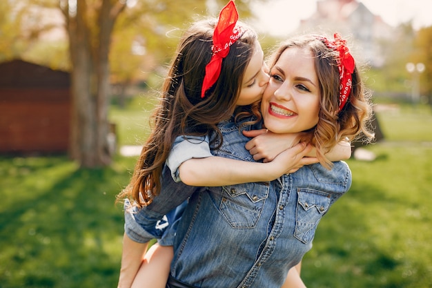 Cute and stylish family in a spring park