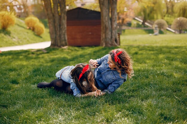 Cute and stylish family in a spring park