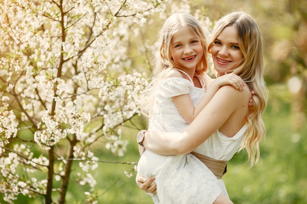 Cute and stylish family in a spring park