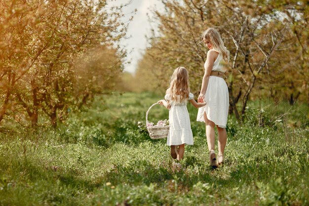 Cute and stylish family in a spring park