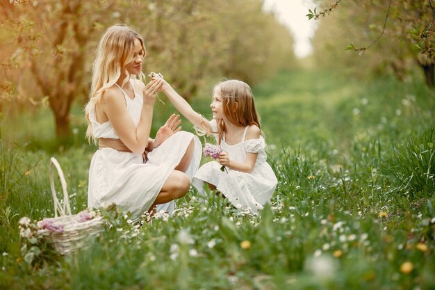 Cute and stylish family in a spring park