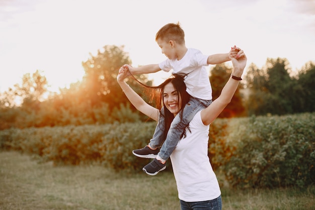 Cute and stylish family in a summer park