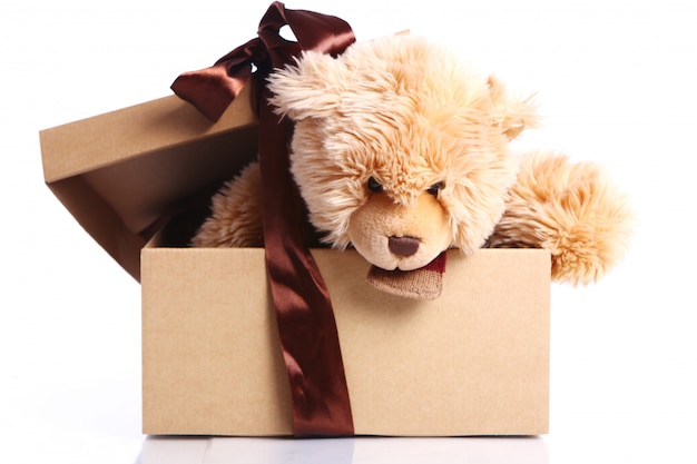 Free photo cute teddy bear in the gift box