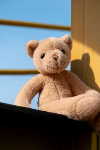 Free photo cute teddy bear outdoors still life