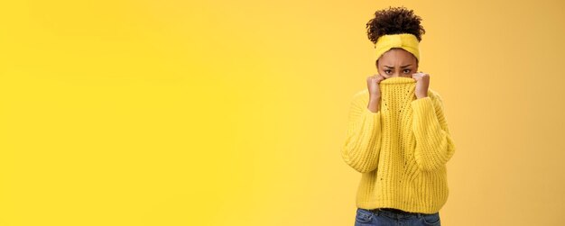 Photo Portrait of African American Girl Pulling Hoodie Strings Laces  Isolated on Vivid Yellow Colored Background Stock Image - Image of black,  multiethnic: 230592381