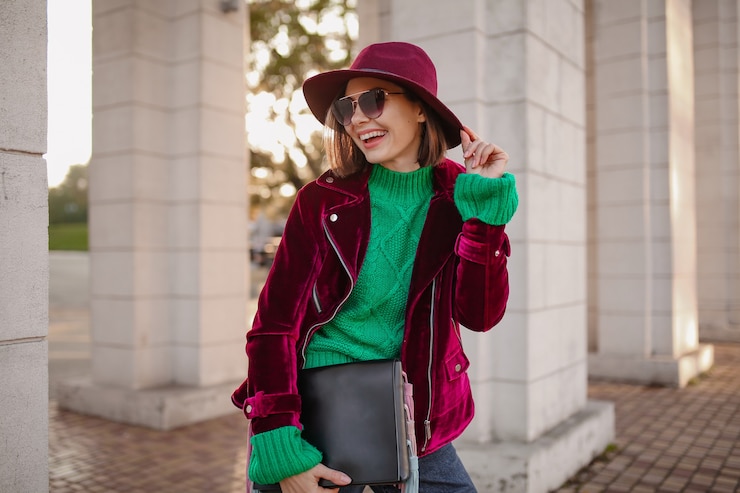 Free Photo cute woman in autumn style trendy outfit walking in street