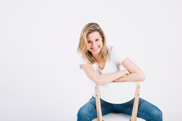 Cute woman on chair