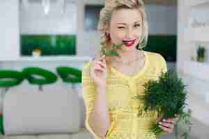 Free photo cute woman at home with salad