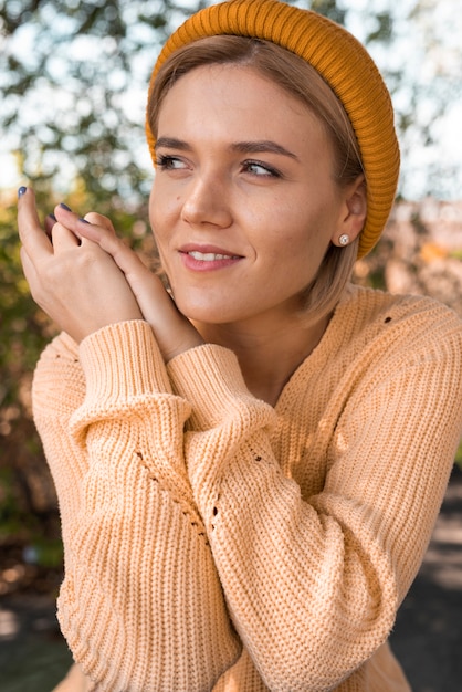 Cute woman posing outdoors