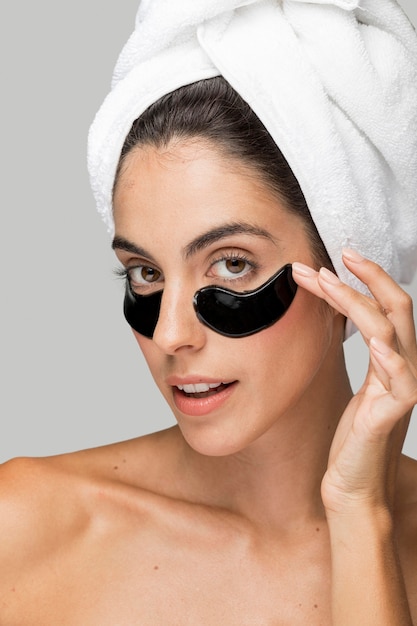 Cute woman with beauty under-eye patches