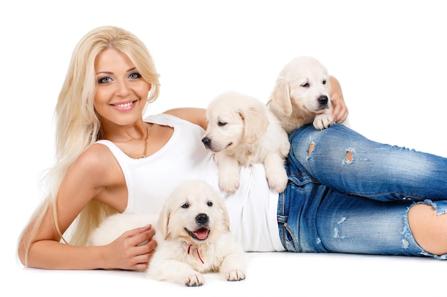 Free photo cute woman with puppies indoor