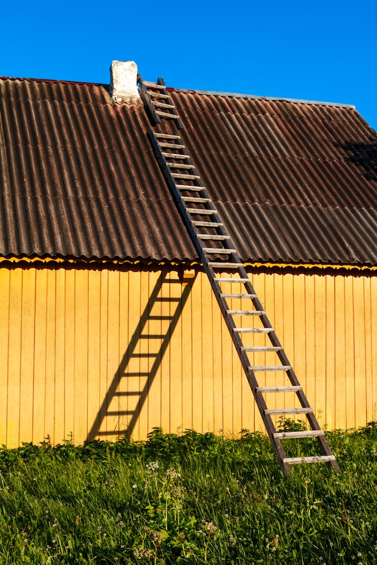 Free Photo cute yellow rural house with wooden stairs in countryside.