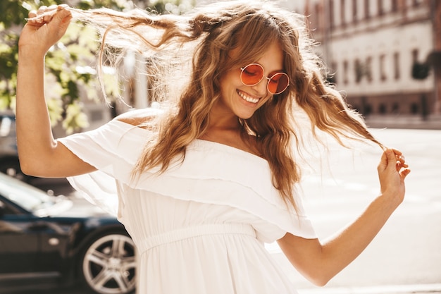 cute young blonde woman with sunglasses