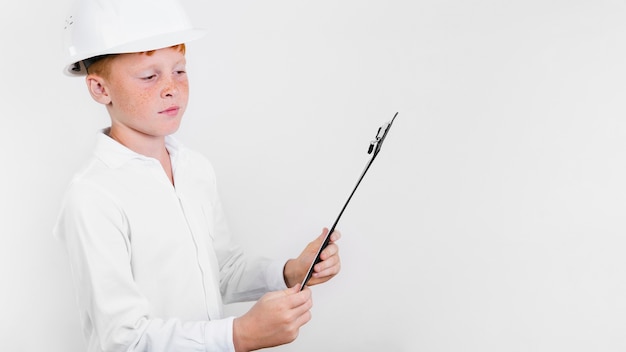 Free photo cute young child with helmet