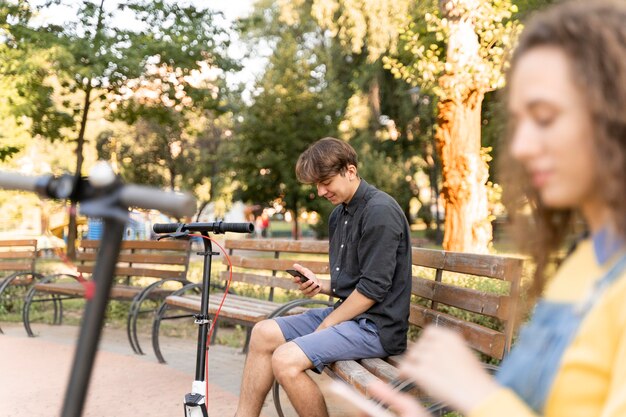 Cute young couple relaxing outdoors