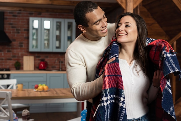 Free photo cute young couple together at home