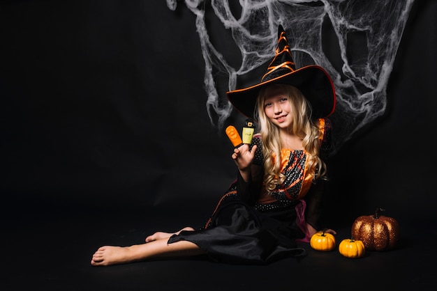 Cute young girl with puppets on fingers