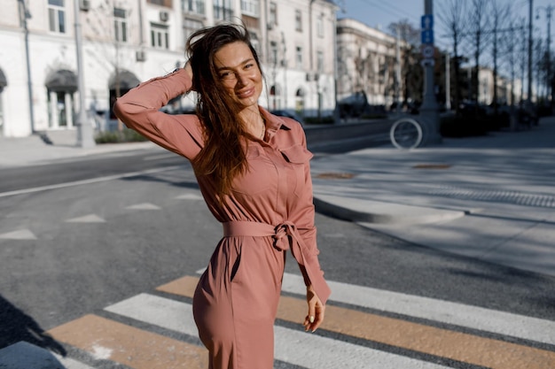 cute young happy woman in the street