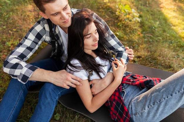 Cute young man and woman enjoying time outdoors