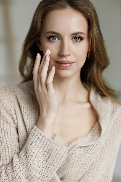 cute young woman skincare portrait