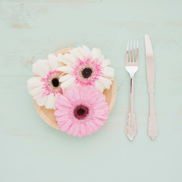 Cutlery near pretty flowers