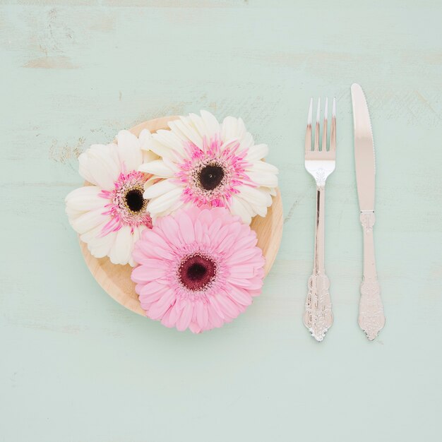 Cutlery near pretty flowers