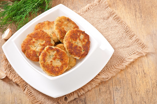 Cutlets cauliflower with fennel, garlic and cheese sauce