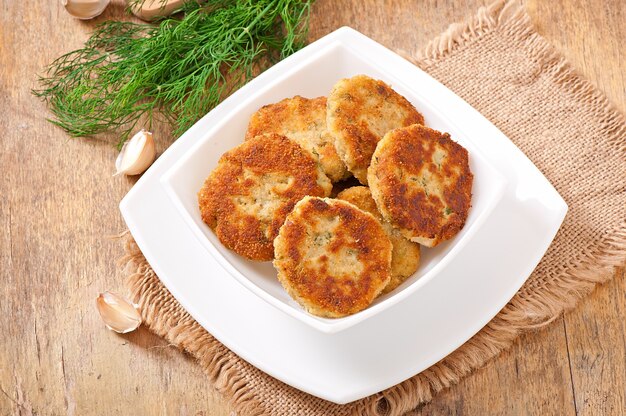 Cutlets cauliflower with fennel, garlic and cheese sauce