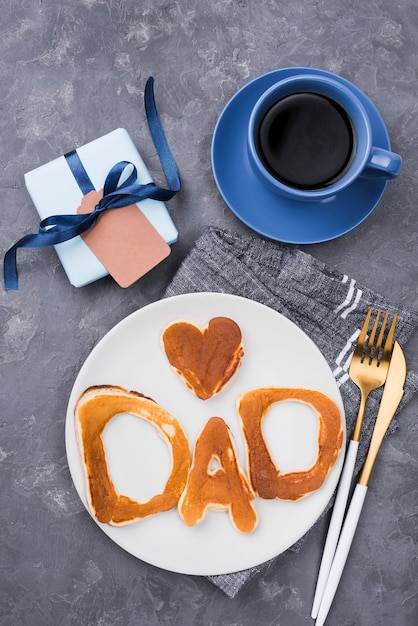 Cutout bread with cutlery and coffee