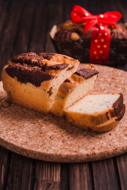 Cutted brownie on cork stand