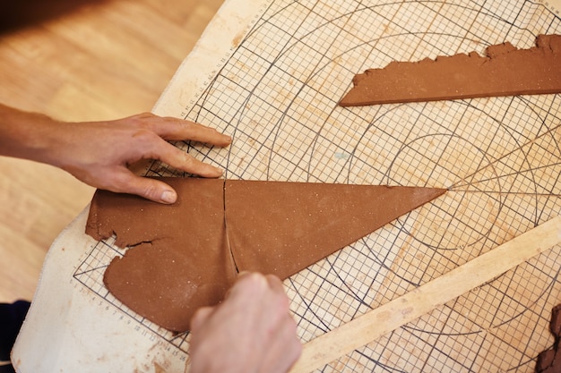 Cutting rolled clay