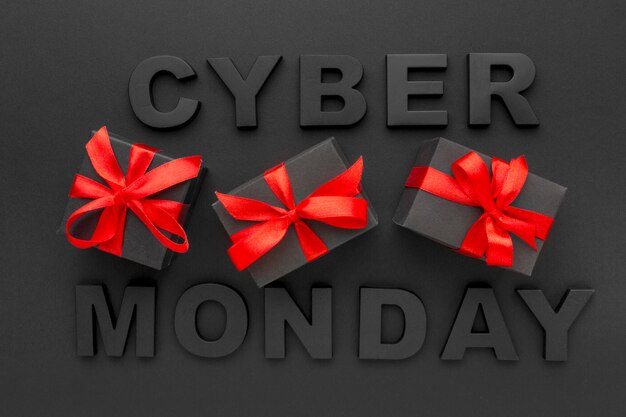Cyber monday and gift boxes with red ribbon