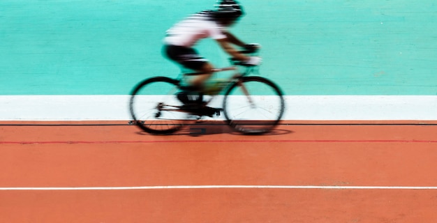 Cyclist biking at a stadium