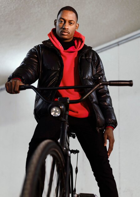 cyclist man spending time with his bike