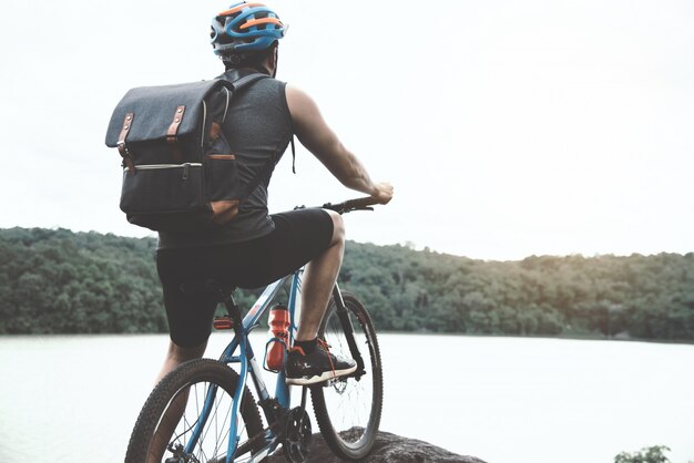 Cyclist On Sunny Day.Bike Adventure Travel Photo