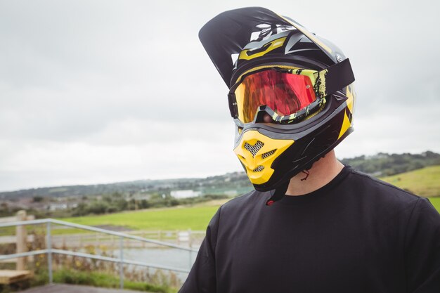 Cyclist wearing a helmet