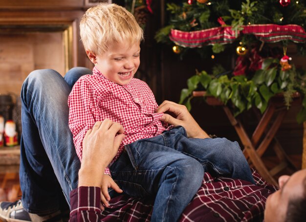 Dad and son playing on the floor