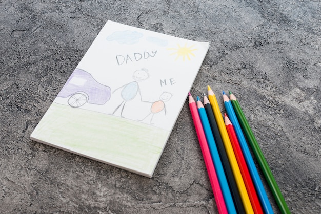 Daddy and me inscription with bright pencils